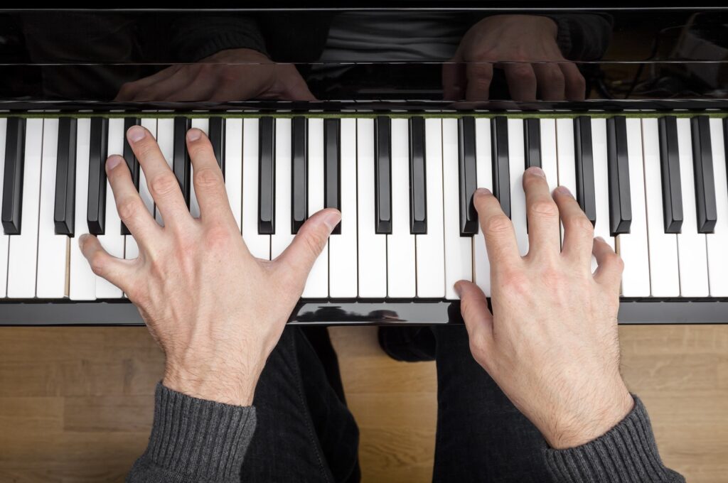 A person playing a piano.