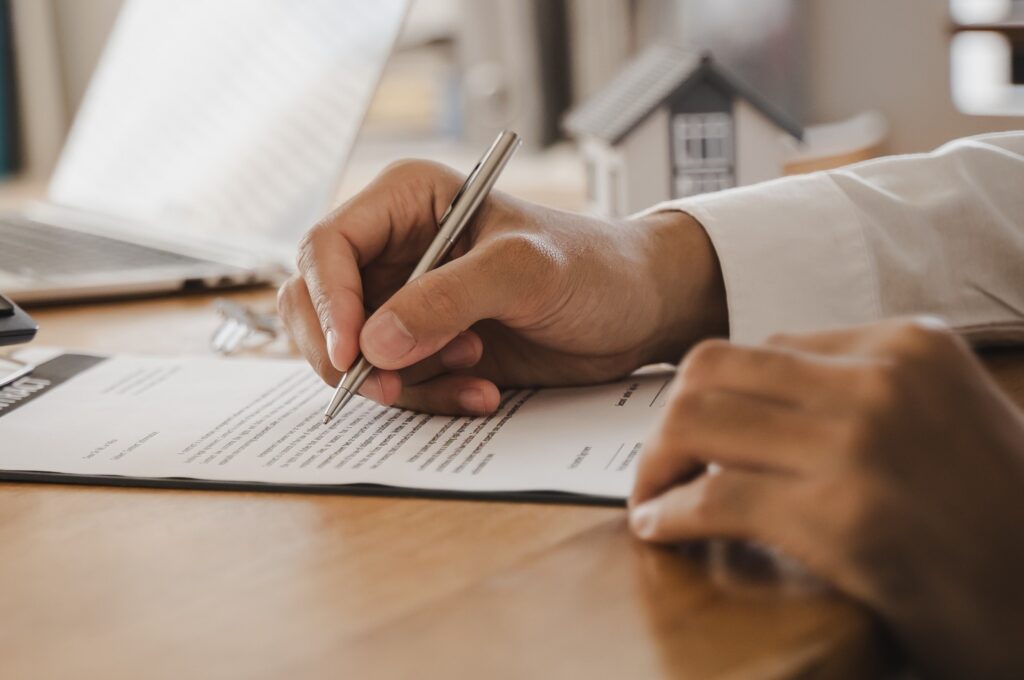 A man checking paperwork.