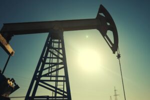 A silhouette of an oil pump.